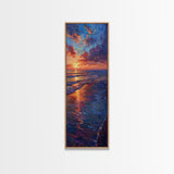 Framed Canvas Print of a Colorful Skinny Art Sunset Over the Ocean with a Vibrant Sky Reflecting on the Water in this Tall Coastal Landscape Art