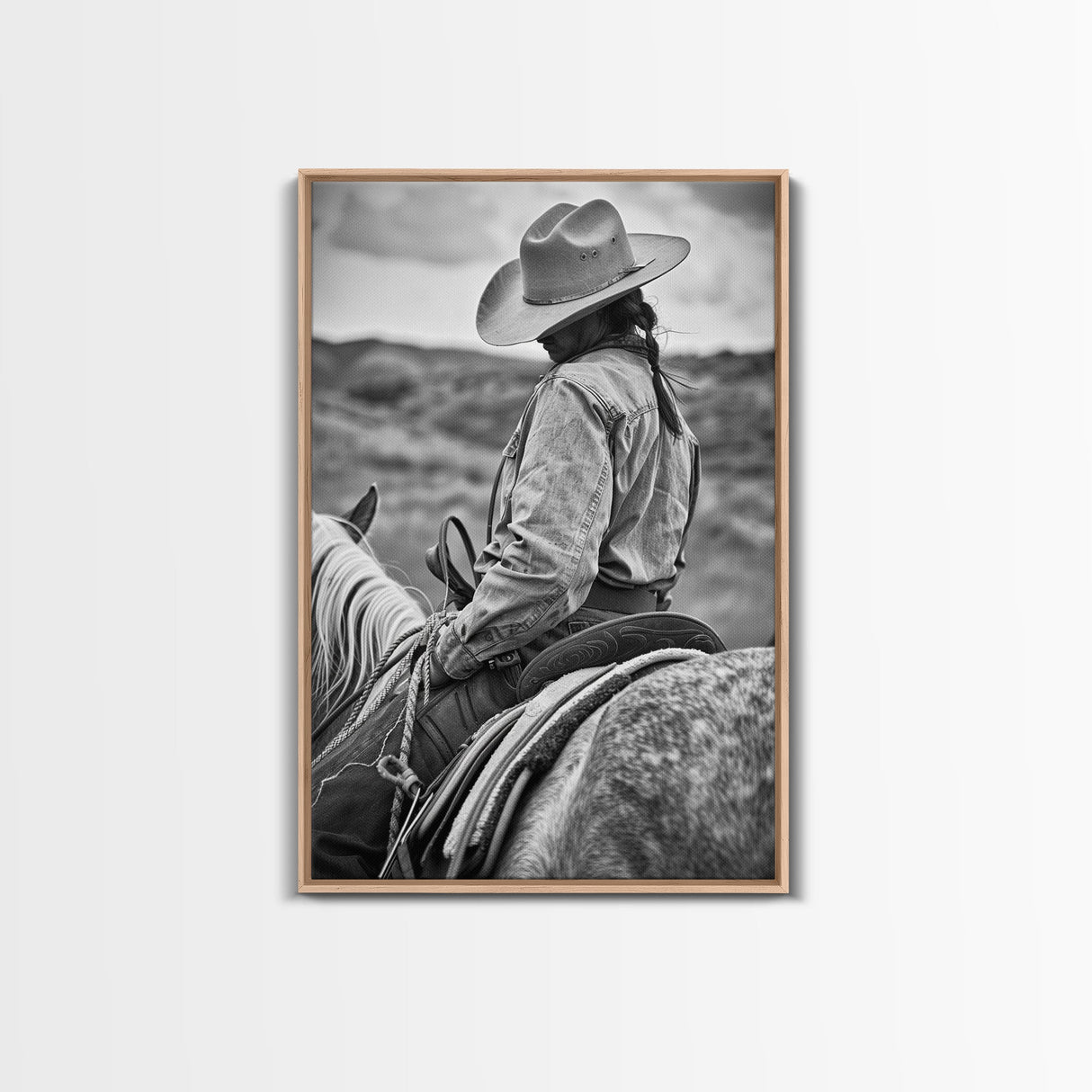 Lone cowboy riding a horse through rugged landscape, classic Western decor black and white photography, Framed Canvas Print, rustic home art