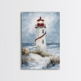 Snowy lighthouse wrapped with festive garland, Framed Canvas Print, beach Christmas decor, holiday wall art perfect for coastal homes