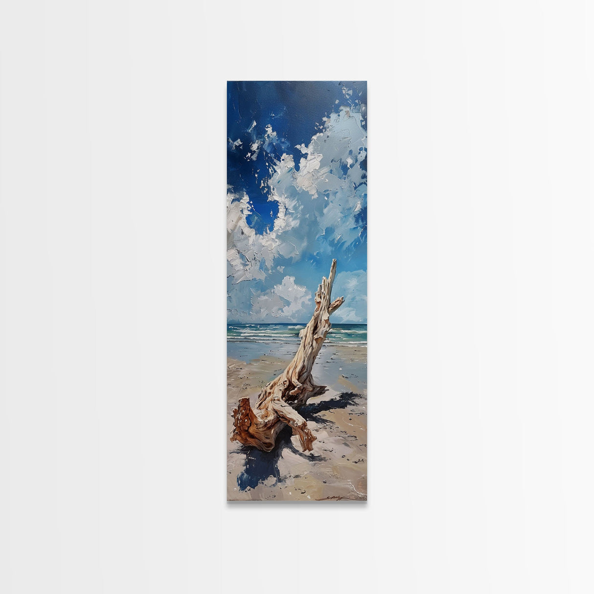 Framed Canvas Print Tall Art Featuring a Piece of Driftwood on a Sandy Beach with Bright Blue Sky and Ocean Waves, Ideal Skinny Art for Coastal Homes