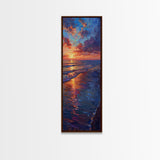 Framed Canvas Print of a Colorful Skinny Art Sunset Over the Ocean with a Vibrant Sky Reflecting on the Water in this Tall Coastal Landscape Art