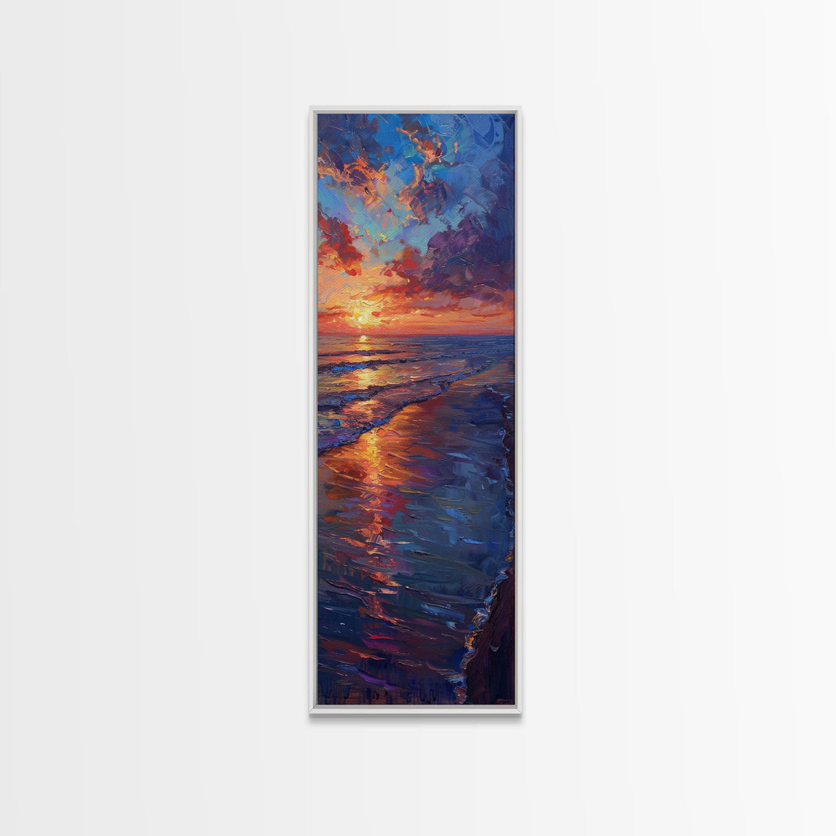 Framed Canvas Print of a Colorful Skinny Art Sunset Over the Ocean with a Vibrant Sky Reflecting on the Water in this Tall Coastal Landscape Art