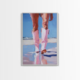 Woman wearing pink cowboy boots standing on the beach, vibrant pop art style Framed Canvas Print - beach fashion, coastal decor, summer art