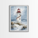 Snowy lighthouse wrapped with festive garland, Framed Canvas Print, beach Christmas decor, holiday wall art perfect for coastal homes