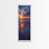 Framed Canvas Print of a Colorful Skinny Art Sunset Over the Ocean with a Vibrant Sky Reflecting on the Water in this Tall Coastal Landscape Art