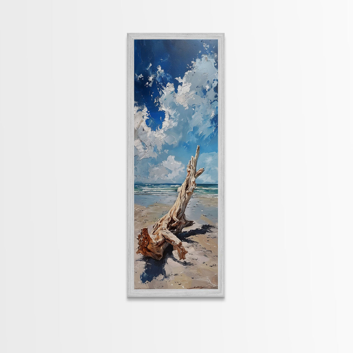 Framed Canvas Print Tall Art Featuring a Piece of Driftwood on a Sandy Beach with Bright Blue Sky and Ocean Waves, Ideal Skinny Art for Coastal Homes