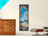 Framed Canvas Print Skinny Art of a Sunlit Beach Scene Framed by Rocky Cliffs, Overlooking a Crystal Blue Sea Under a Clear Sky, Perfect Tall Coastal Art