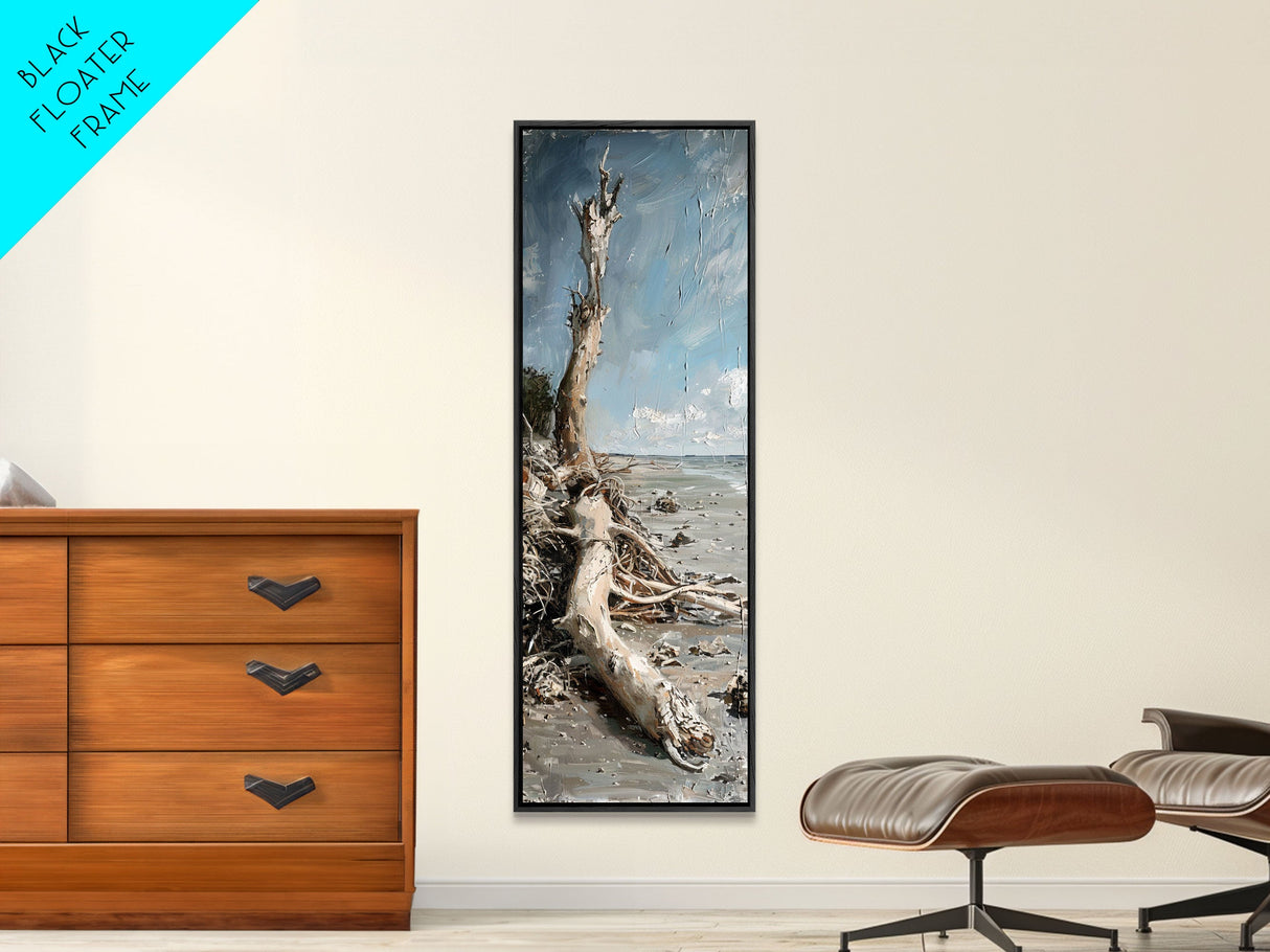 Framed Canvas Print Skinny Art of a Weathered Driftwood Tree Trunk on a Sandy Shore with a Calm Ocean Backdrop, Ideal Tall Art for Coastal Decor